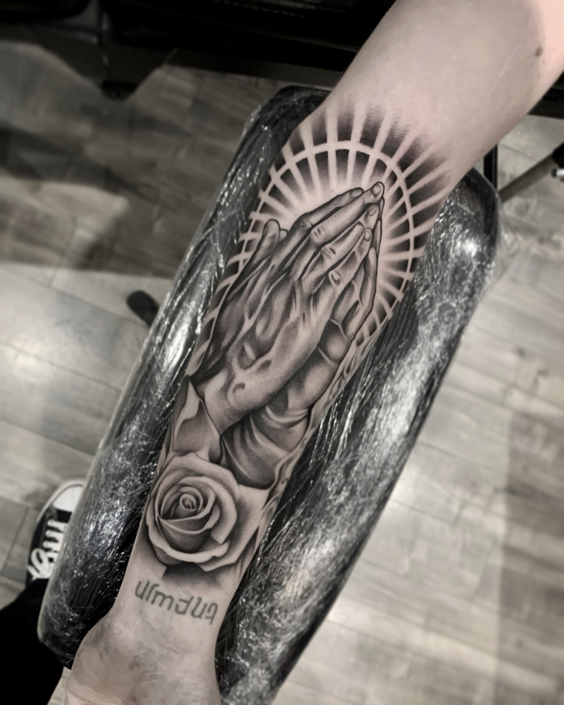 Stunning black and white religious tattoo by Damian ST